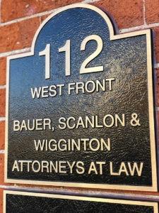 Photo of the address board of the law firm Bauer, Scanlon, & Wigginton L.L.C.